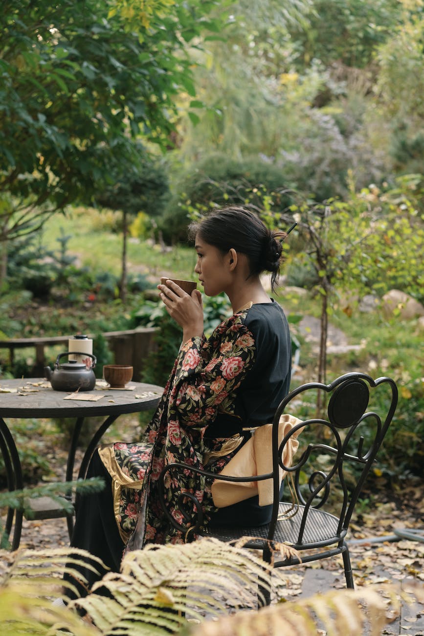 a woman drinking a tea