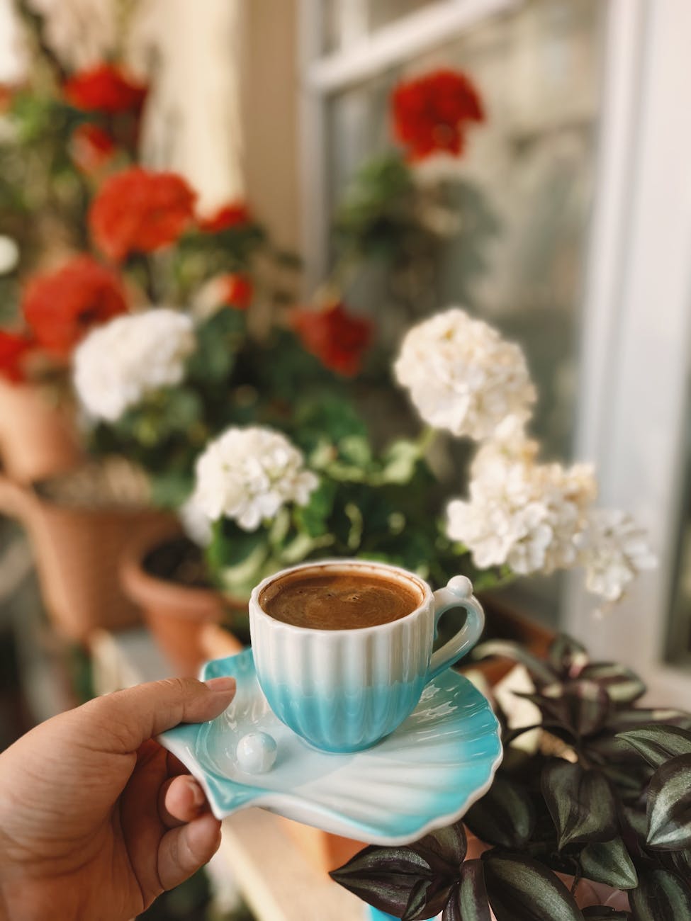 charming morning coffee in floral balcony setting